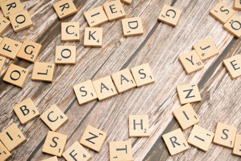 Scrabble letters spelling SaaS.